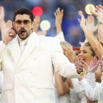 Bad Bunny performing at Super Bowl LX halftime show 2026 with Puerto Rican flag