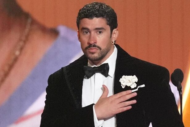 Bad Bunny performing on stage after winning a Grammy Award