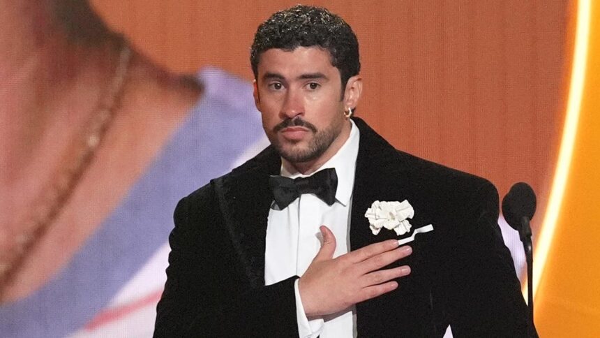 Bad Bunny performing on stage after winning a Grammy Award